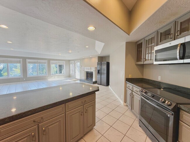 Building Photo - Garden Level in Luxury Home Available Now