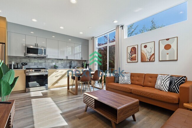 Building Photo - Offer: Unfurnished option available at $3,250, with an optional furnished package for an addition...