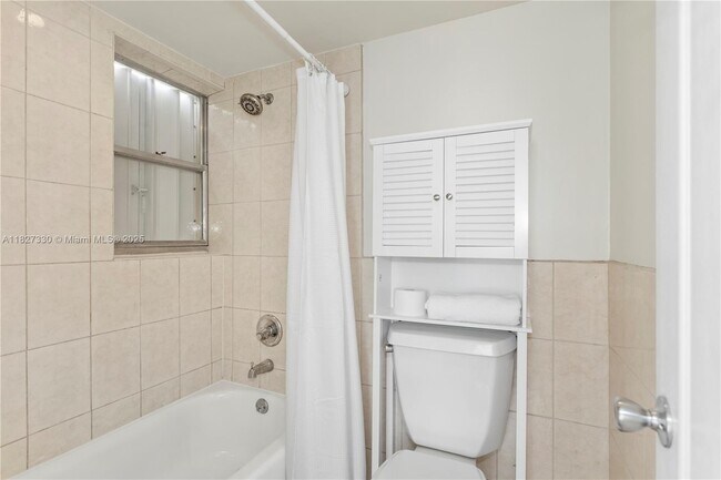 Building Photo - 9440 W Bay Harbor Dr