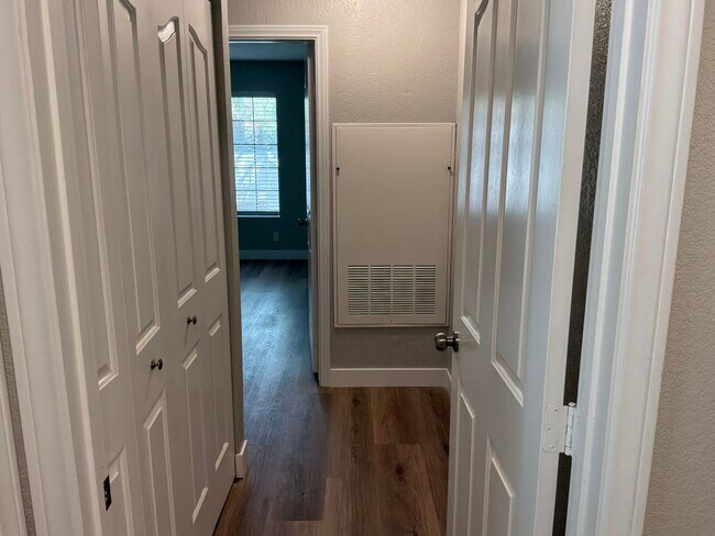 Building Photo - Condo 3 bedrooms 2 bathrooms 1 car garage gated subdivision.