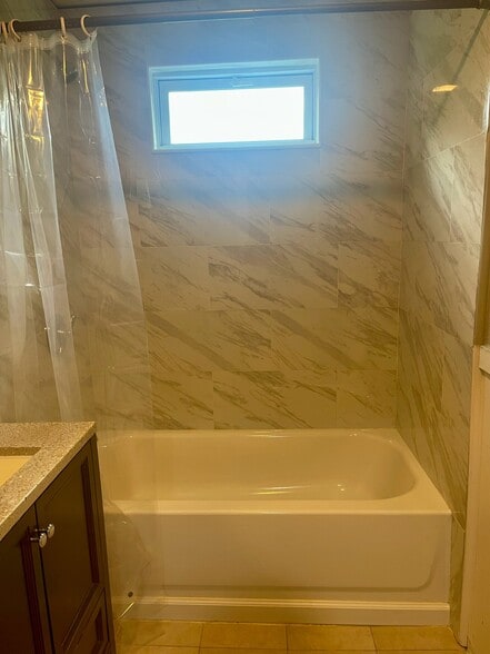 Bathroom with sit in tub - 348 Rollstone St