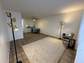 Building Photo - Pet friendly! 2 bedrooms, 1.5 bath, 1 park...