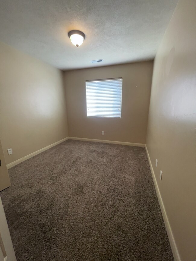Building Photo - Stunning Cedar Townhome