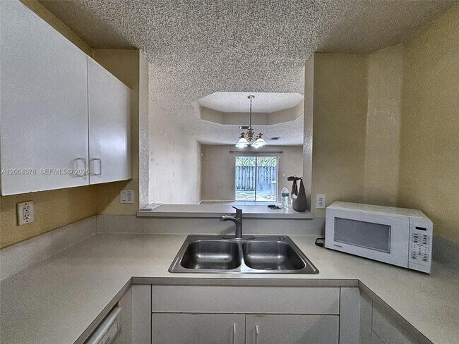Building Photo - 14391 SW 120th Ct