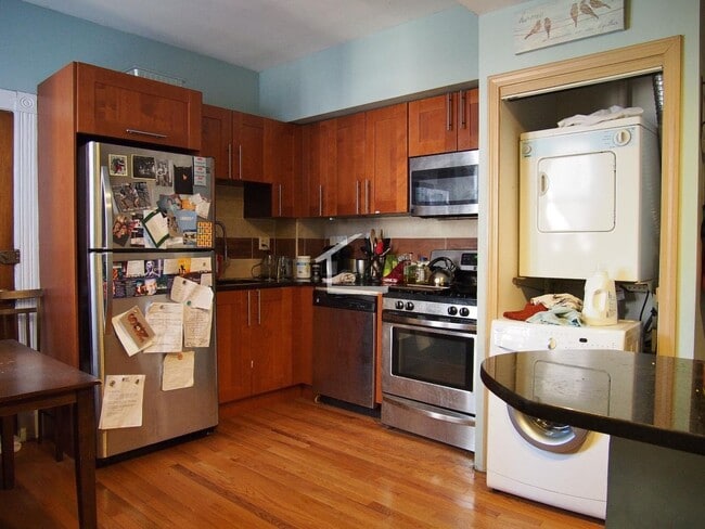 Building Photo - Great four bed, two bath, laundry in unit, heat included