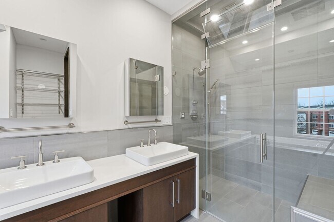 Building Photo - This exceptional West Market location is just steps from Reston Town Center, offering convenient ...