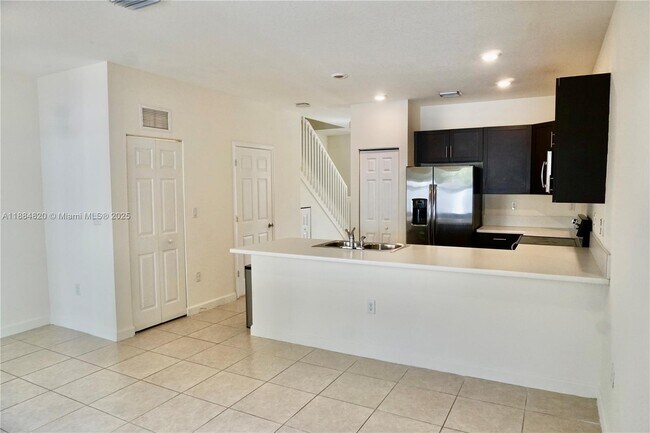 Building Photo - 10606 West 33rd Ct