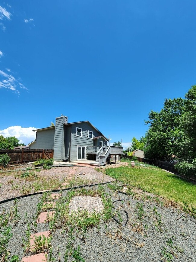 Building Photo - Spacious 4-Bedroom Home with RV Parking in...
