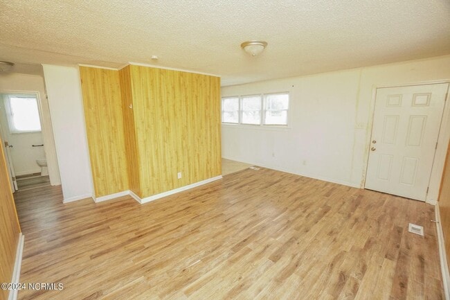 Building Photo - Lawn Care Included in Jville City Limits!