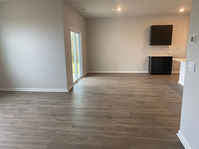 Building Photo - Brand New Construction - 4 bedroom 2 full ...