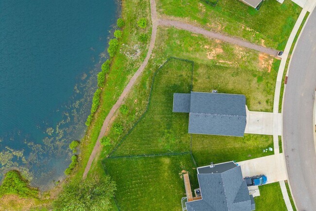 Building Photo - Stocked Pond, Walking Trails and More!!