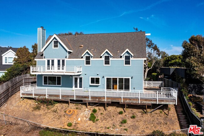 Building Photo - 6457 Surfside Way