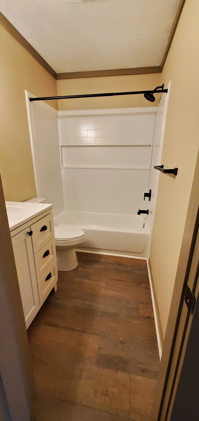 Full bath with storage - 303 Clint Norris Rd