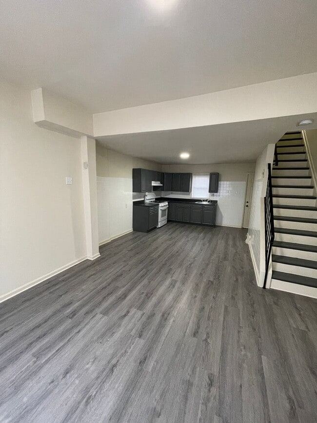 Building Photo - Four Bedroom House For Rent