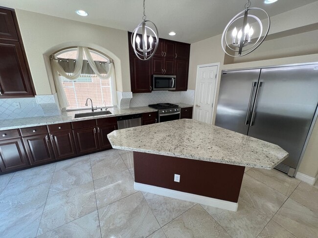 Building Photo - A Fantastic 4 Bedroom Home with the primary Downstairs, in Silverado Ranch