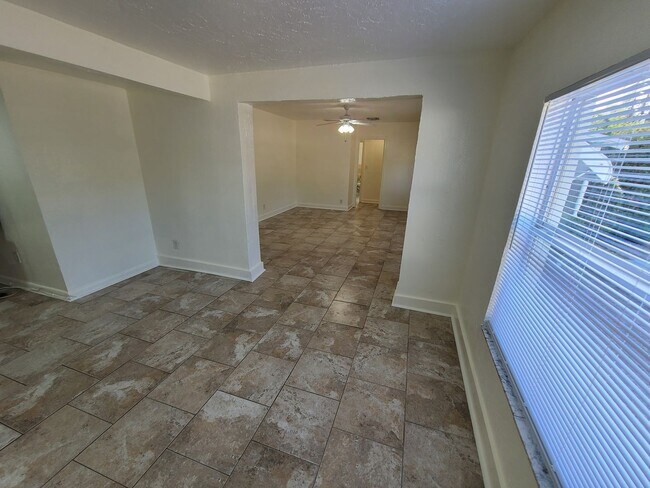Building Photo - Stunning Corner-Lot Rental: 4BR/2BA with Courtyard