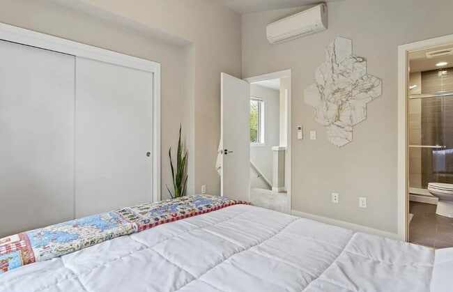 Building Photo - Dual Masters! Stunning Modern End-Unit Townhome in Buckman Bright, Airy & Designed for Comfort