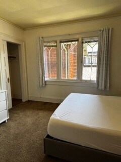 Single bedroom, windows, curtains, plus mini blinds - 2615 Parker St