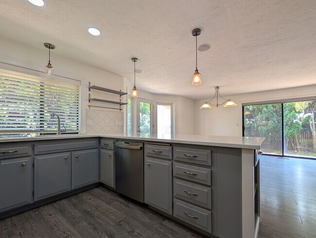 Building Photo - Updated 3-Bedroom, 2.5-Bath Home ~ Solid Surface Flooring and Spacious Kitchen!