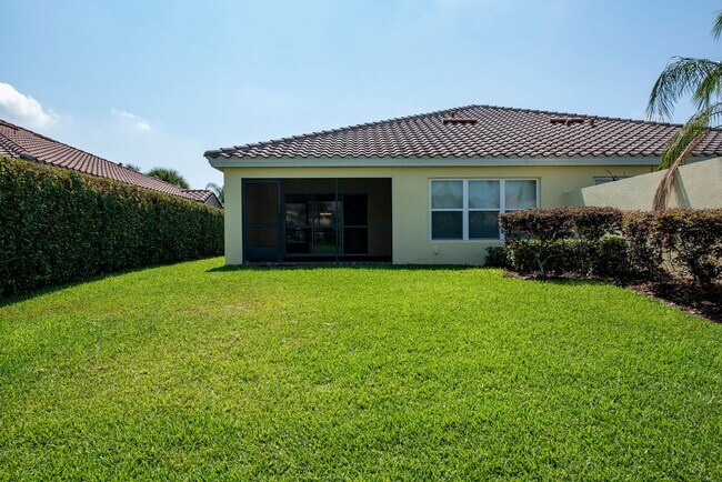 Building Photo - Deluxe Villa Lake view all Tile. 3 Bedrooms+2 Baths