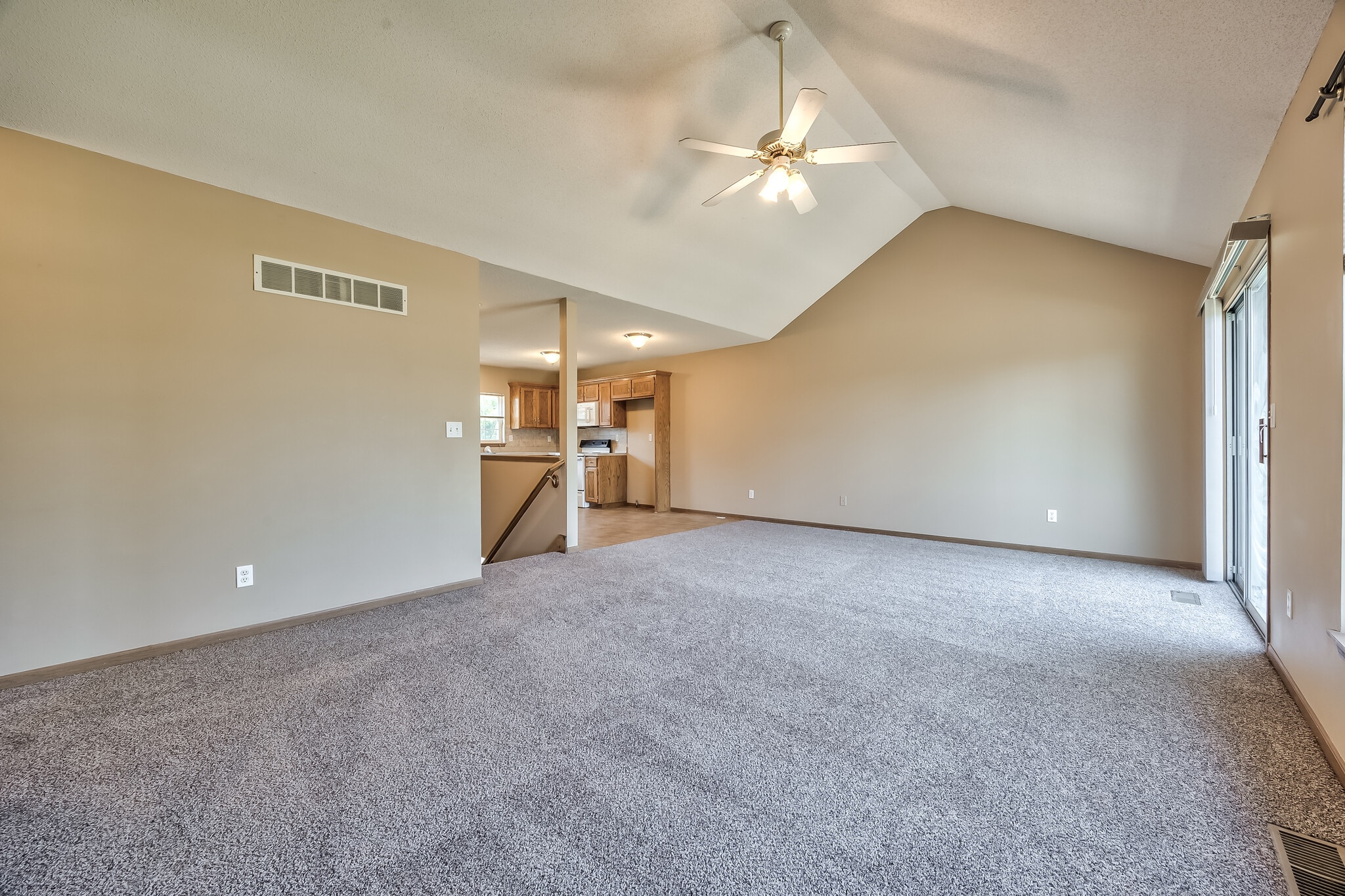 2nd floor living room with vaulted ceiling - 11220 W 61st St