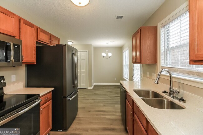 Building Photo - 10990 Knotty Pine Pl