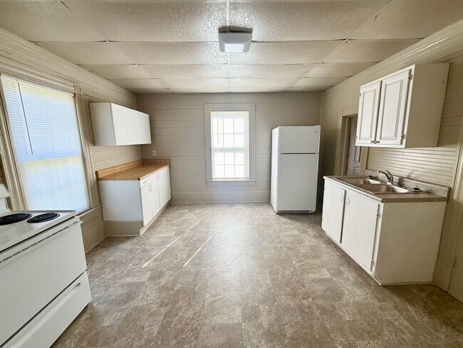 Building Photo - Three Bedroom, 1 Bath Gibsonville Home with Rocking Chair Front Porch