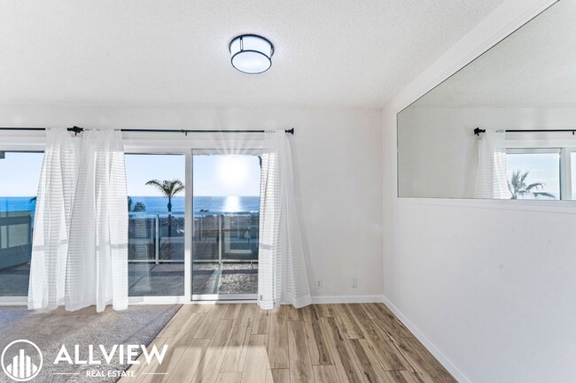 Building Photo - Stunning Ocean Views! 1 Bedroom Condo Avai...