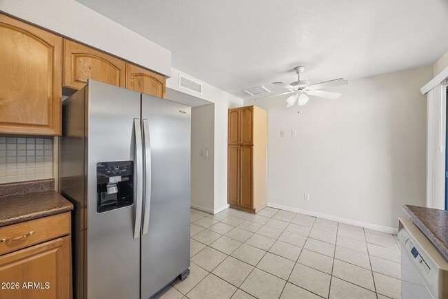 Building Photo - 5704 E Aire Libre Ave