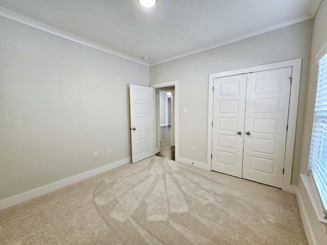 Building Photo - Stunning 4-Bedroom Waterfront Home with Granite Countertops and Hardwood Floors in The Sanctuary ...