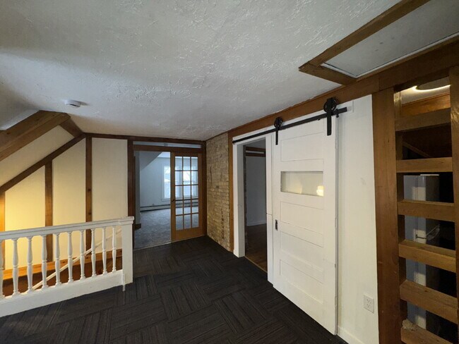 Building Photo - "Charming Studio Gem with Office and Hardwood Floors in the Heart of Minneapolis!"