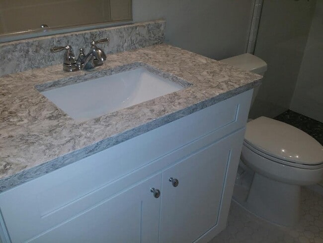 Building Photo - Completely Renovated 3rd Floor condominium with panoramic views GARAGE INCLUDED!