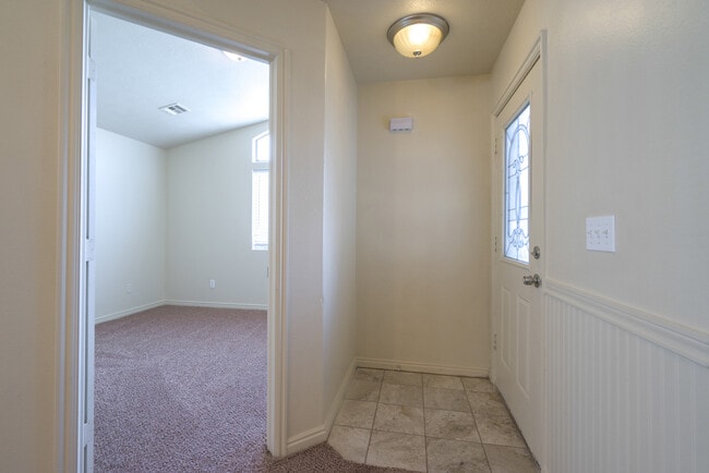 Building Photo - Five bedroom townhome with a walkout basem...