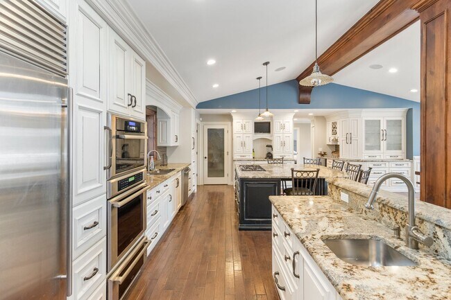 Building Photo - Stunning 5-Bed, 4.5-Bath Custom Home on Du...
