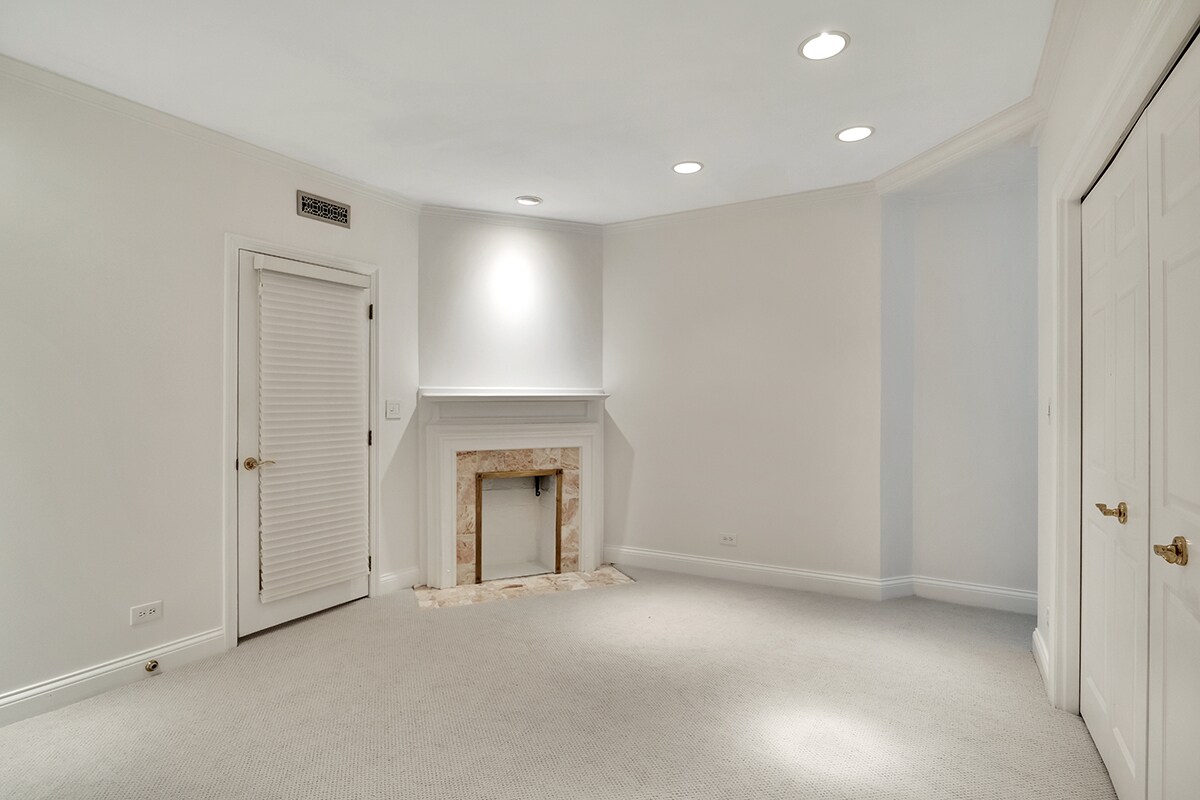 Primary Bedroom (3) - Capped Fireplace - 1228 N Dearborn St