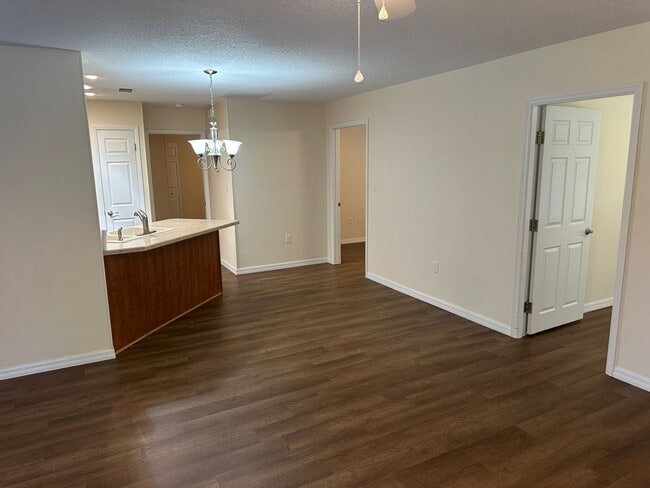 Building Photo - Experience Maintenance-Free 55+ Living at The Cove at Tavares Village!