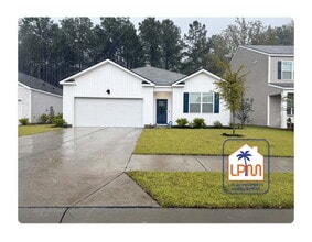 Building Photo - Rare find: **Furnished or Unfurnished**Utilities Included** 4-Bedroom 2-Bathroom Home at The Retr...