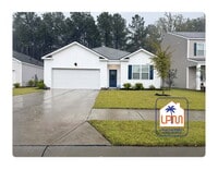 Building Photo - Rare find: **Furnished or Unfurnished**Utilities Included** 4-Bedroom 2-Bathroom Home at The Retr...