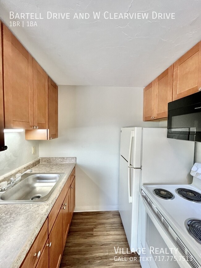 Building Photo - No Steps! Remodeled 1-Bed Convenient to I-...