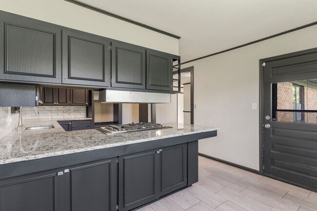 Building Photo - Newly renovated home with a large yard per...