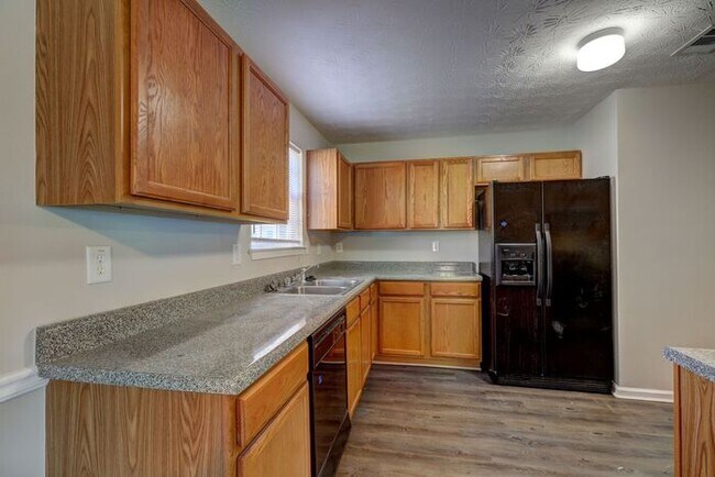 Building Photo - Available Now!