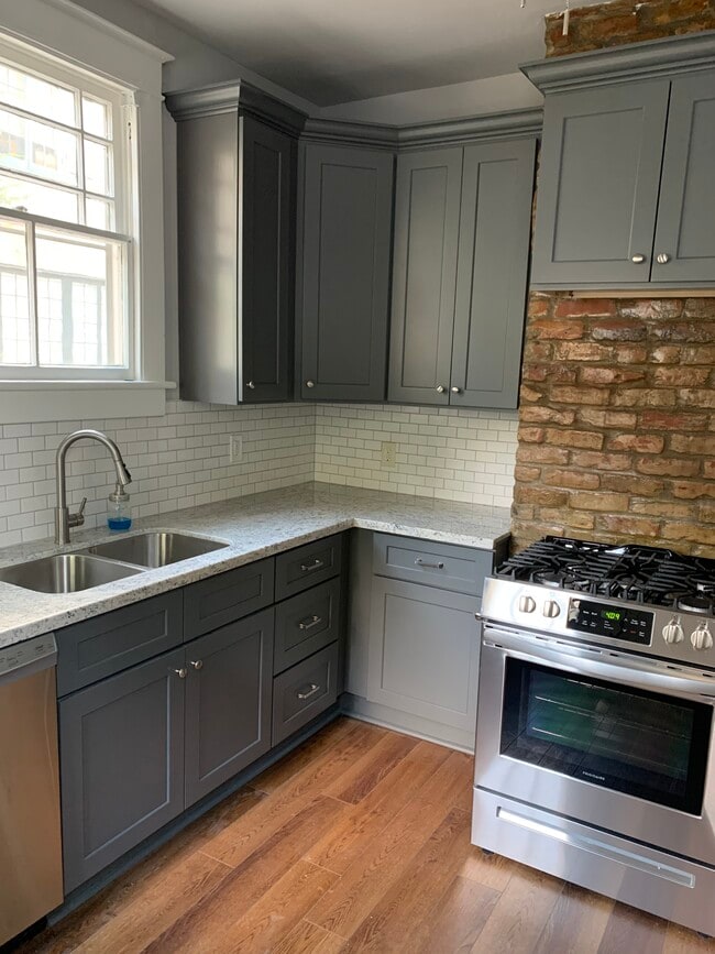 NEW kitchen with granite counters and stainless appliances - 1215 Foucher St