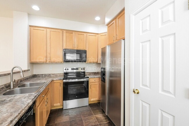 Building Photo - 2241 E 128th Ave