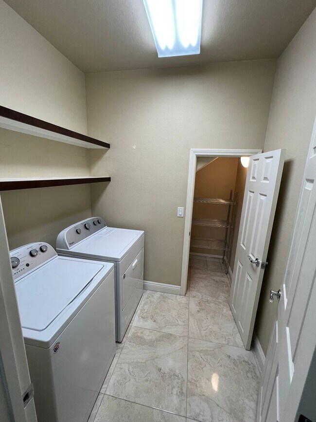 Building Photo - A Fantastic 4 Bedroom Home with the primary Downstairs, in Silverado Ranch