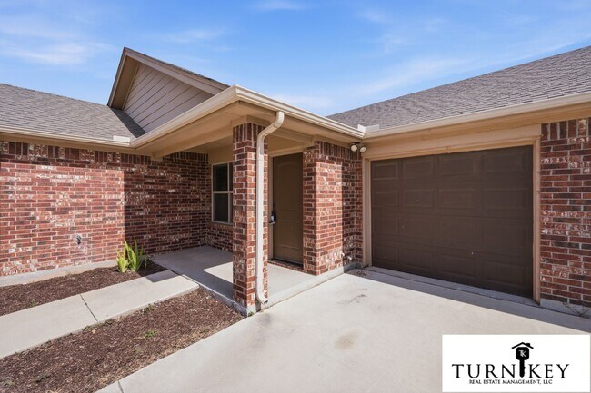Building Photo - 1325-1329 White Sand Dr.