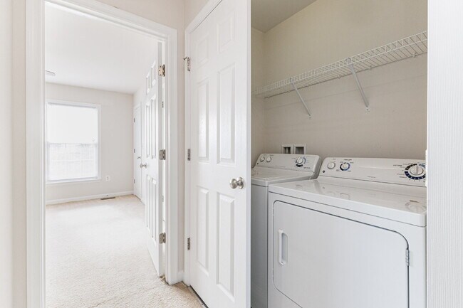 Building Photo - This beautiful townhouse has everything you need in a dream home.