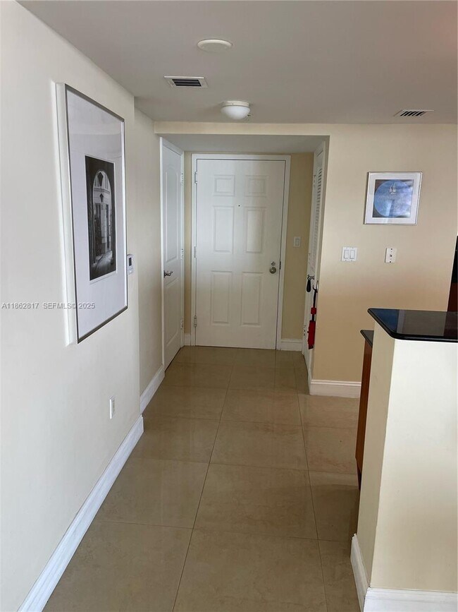 Building Photo - 16699 Collins Ave