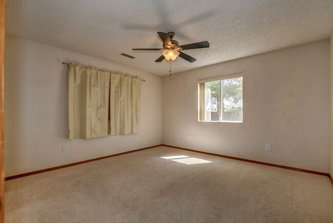 Building Photo - Nice three bedroom two bath home in PV!