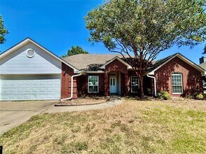 Building Photo - 7724 Sagebrush Ct N
