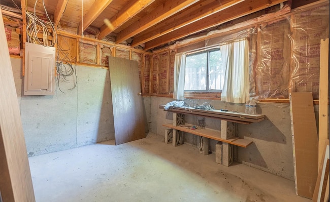Building Photo - Three bedroom two bath home in a quiet nei...